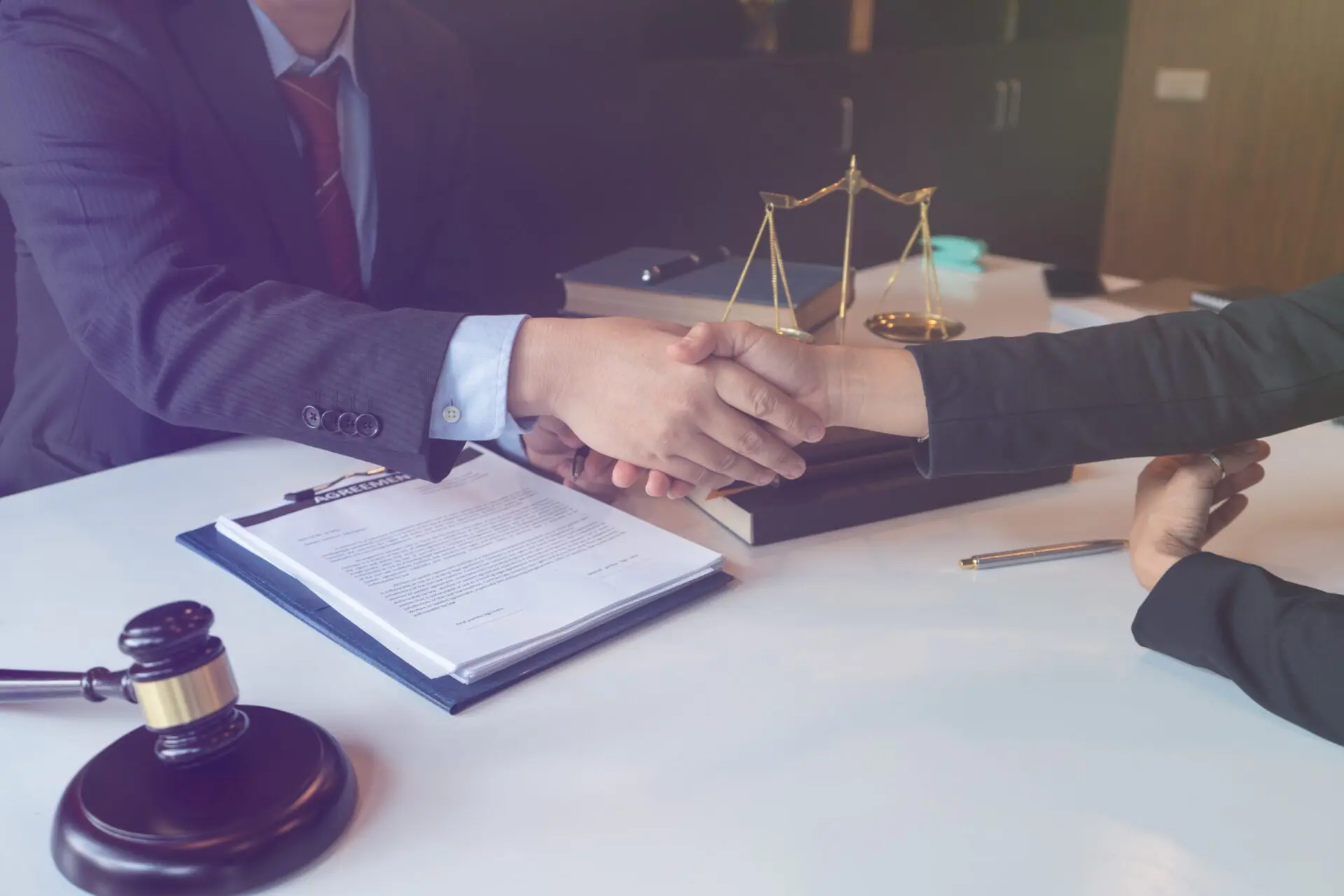 Client and lawyer have a sit down face to face meeting to discuss the legal options available