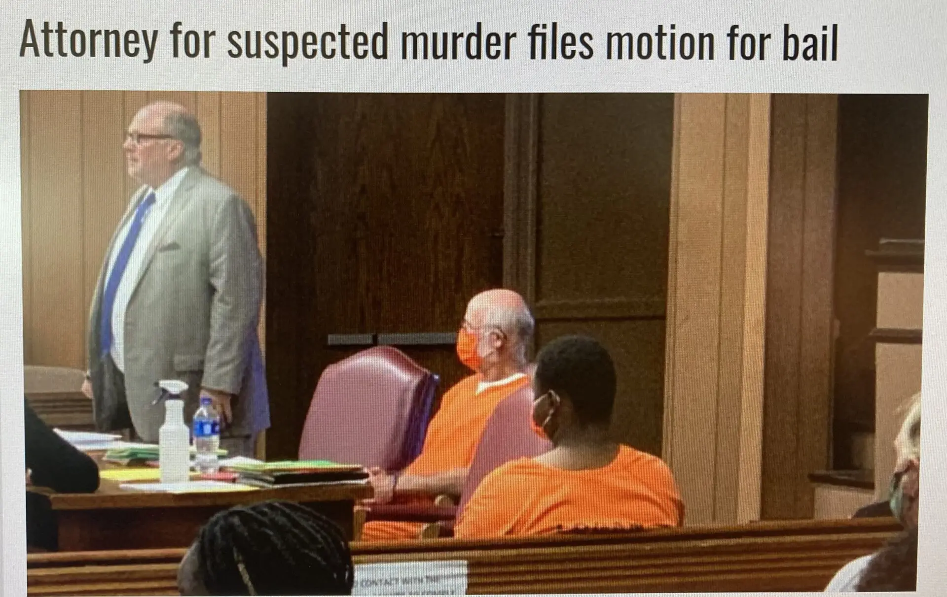 Ron a courtroom scene where a man is standing in front of a judge